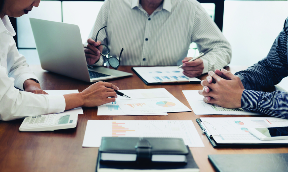 Meeting between three members planning the next project